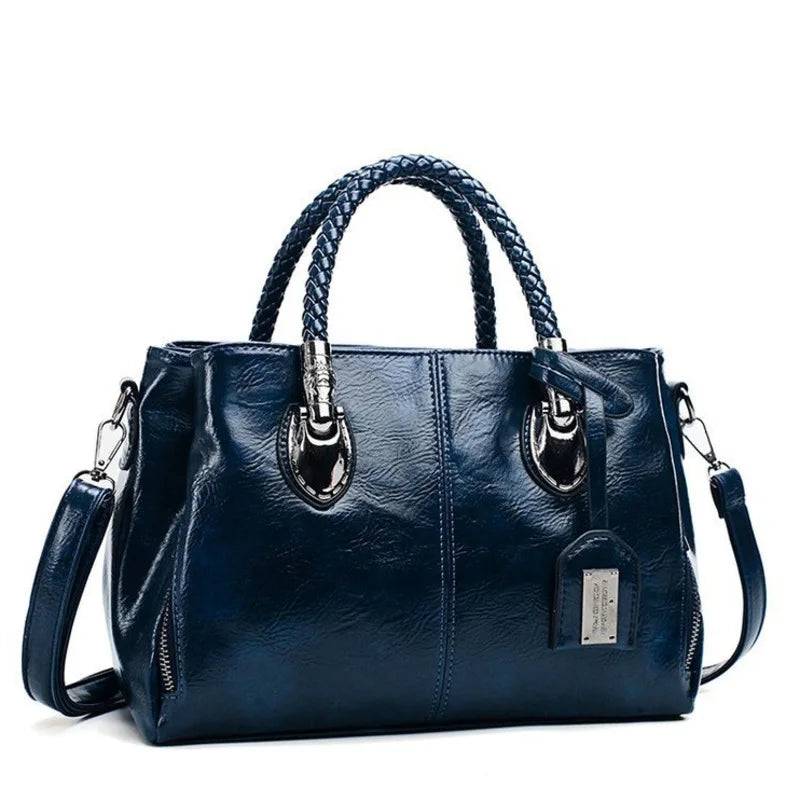Pia™ | Elegante Lederhandtasche mit geflochtenen Griffen