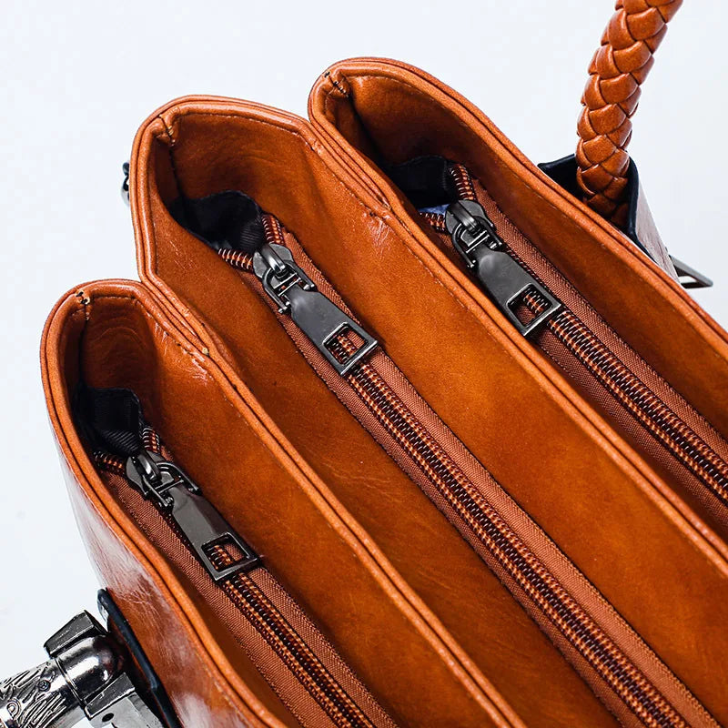 Pia™ | Elegante Lederhandtasche mit geflochtenen Griffen