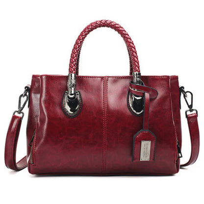 Pia™ | Elegante Lederhandtasche mit geflochtenen Griffen