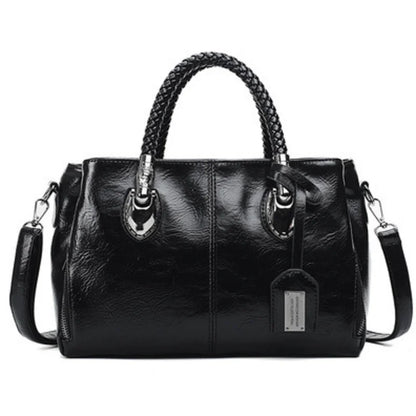 Pia™ | Elegante Lederhandtasche mit geflochtenen Griffen
