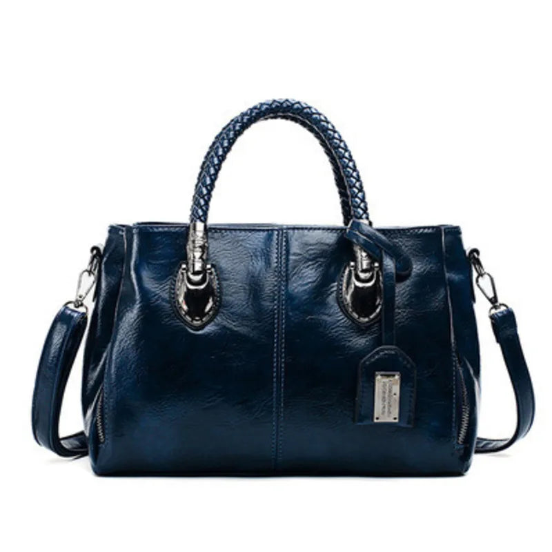 Pia™ | Elegante Lederhandtasche mit geflochtenen Griffen
