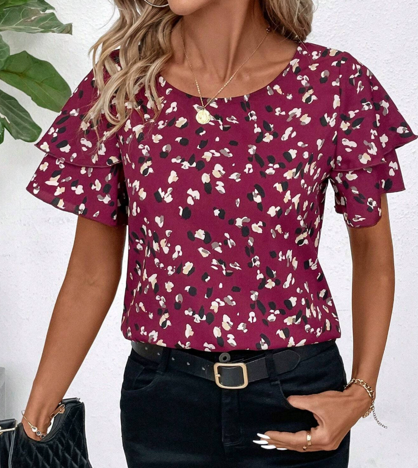 Regina | Modische Bluse mit lustigen Rüschen