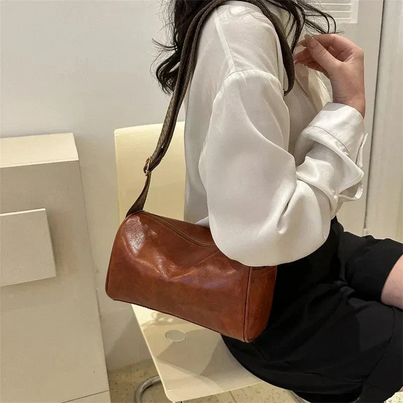 Trine™ | Vintage Leder Crossbody Tasche mit Gewebtem Verstellbarem Riemen